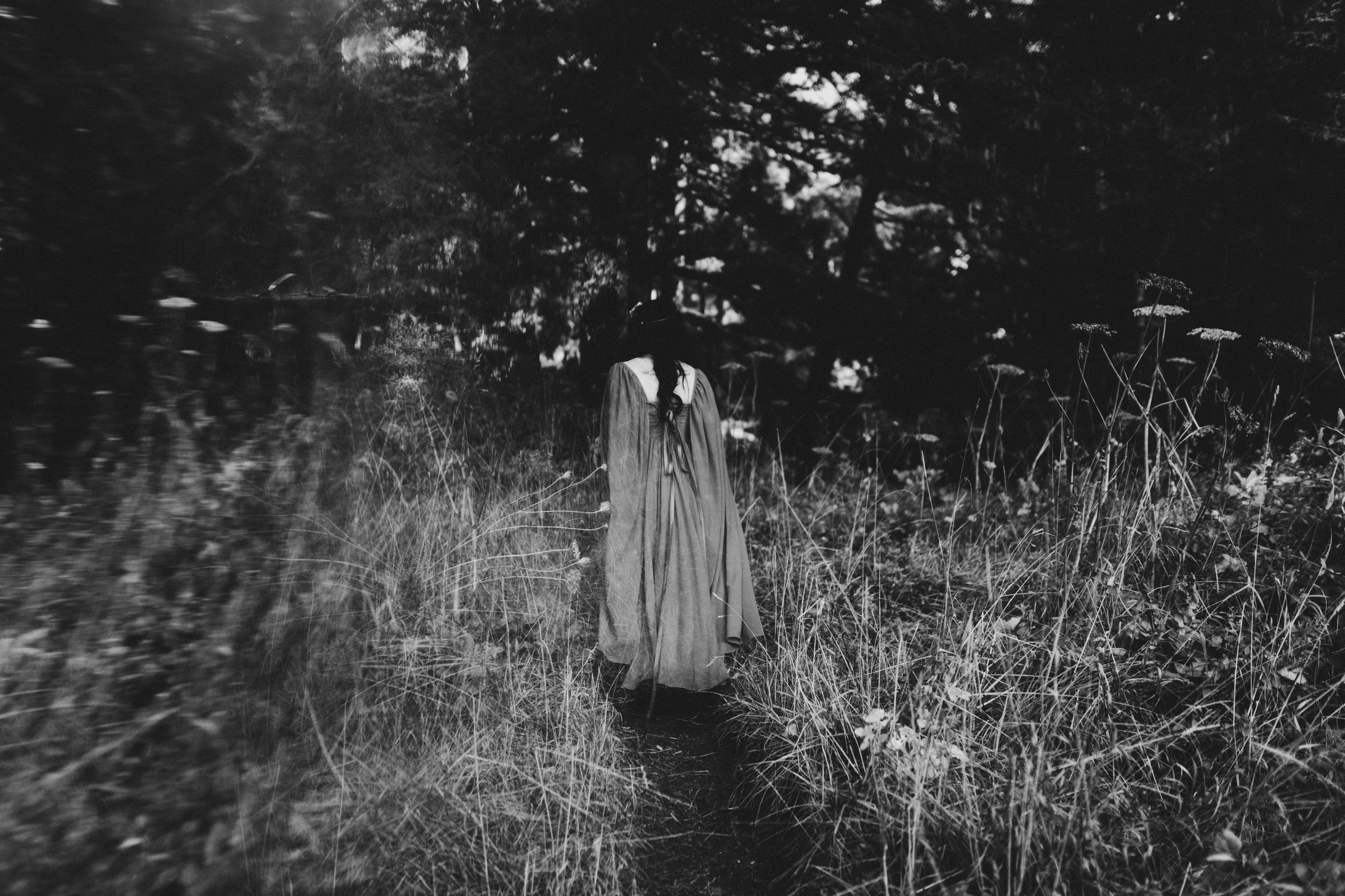 Rachael walks along a trail at Samuel H. Boardman after her elopement.