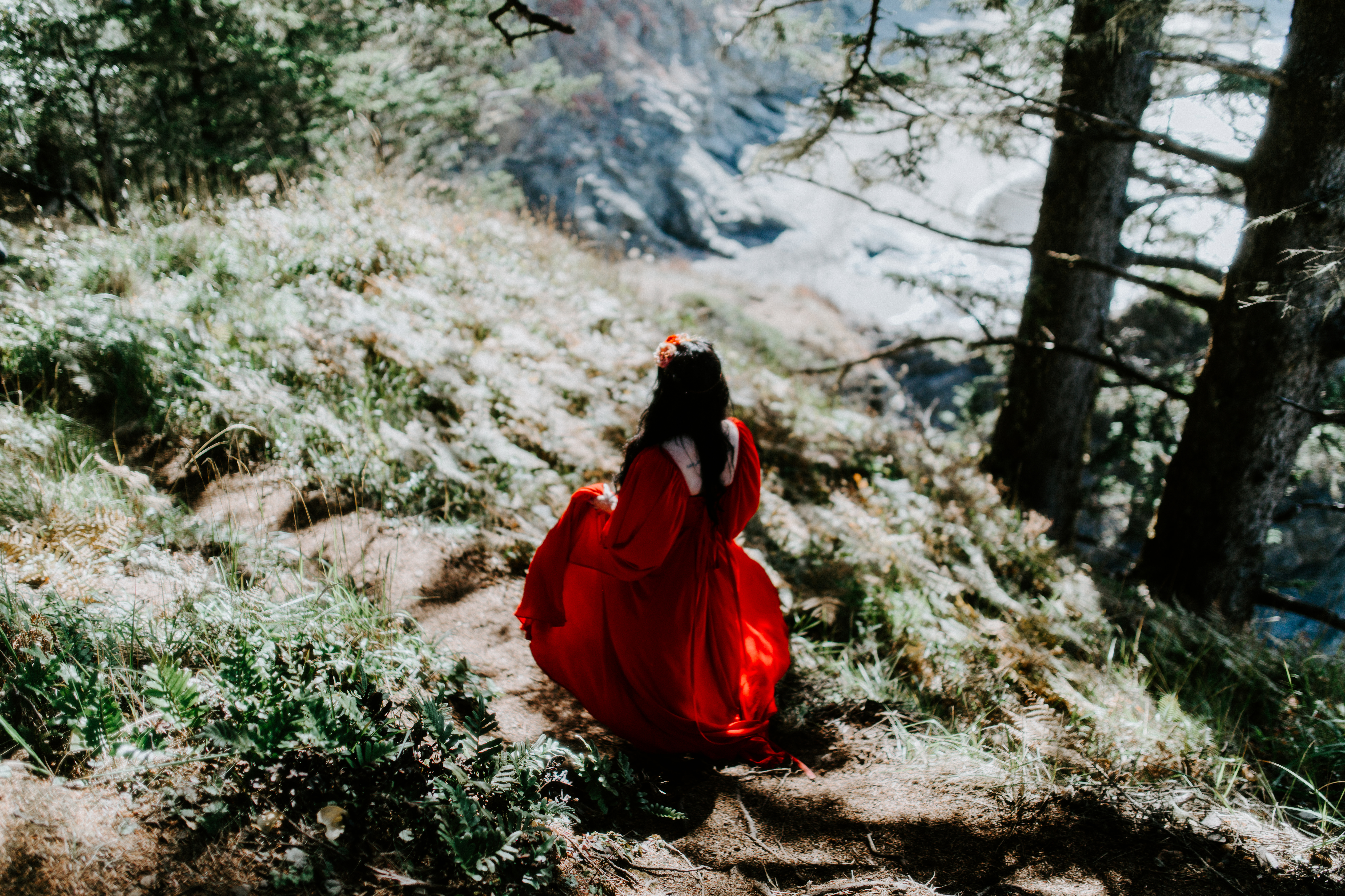 Rachael walks down a path after her elopement at Samuel H. Boardman, Oregon.