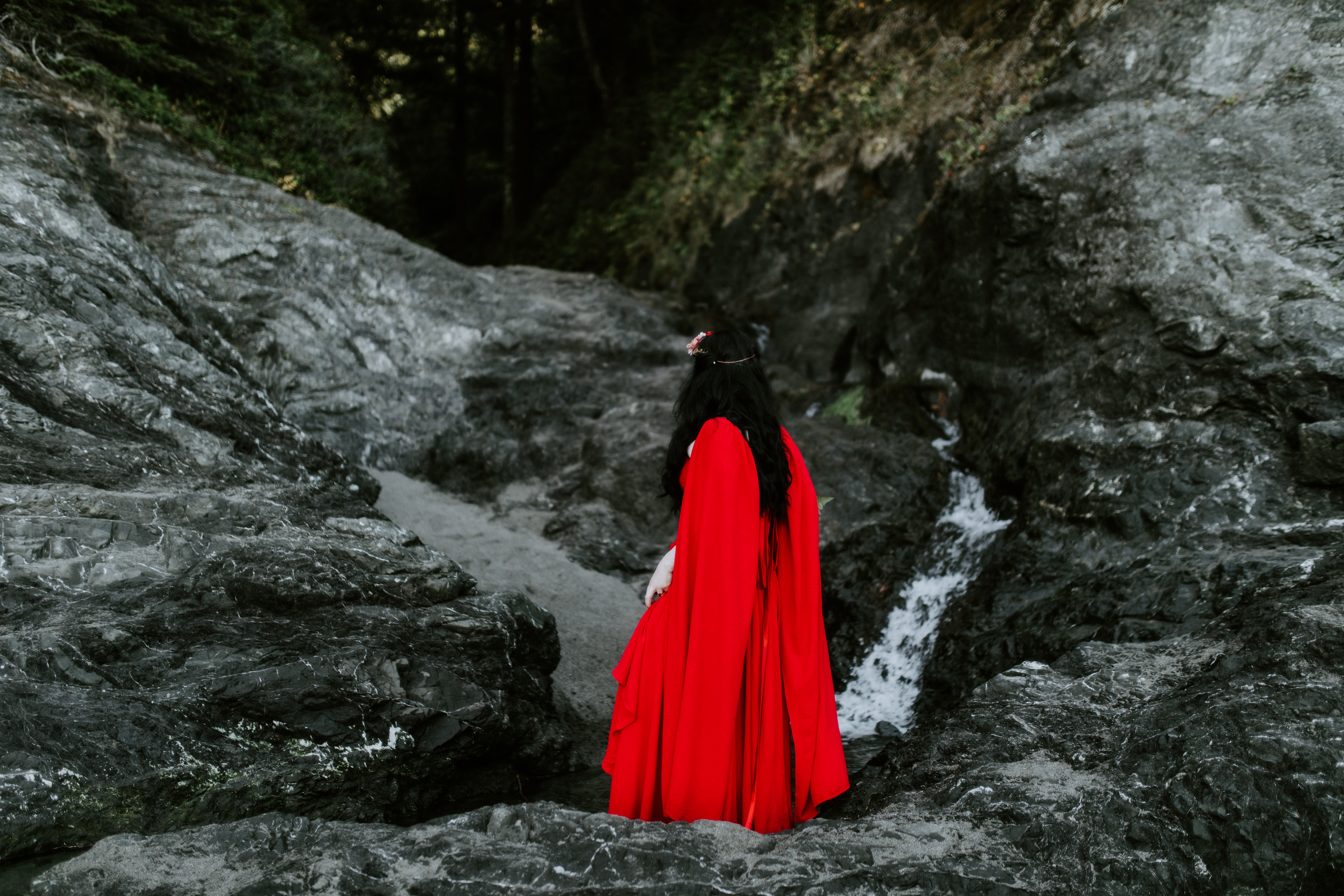 Rachael stands near a small waterfall at Samuel H. Boardman.
