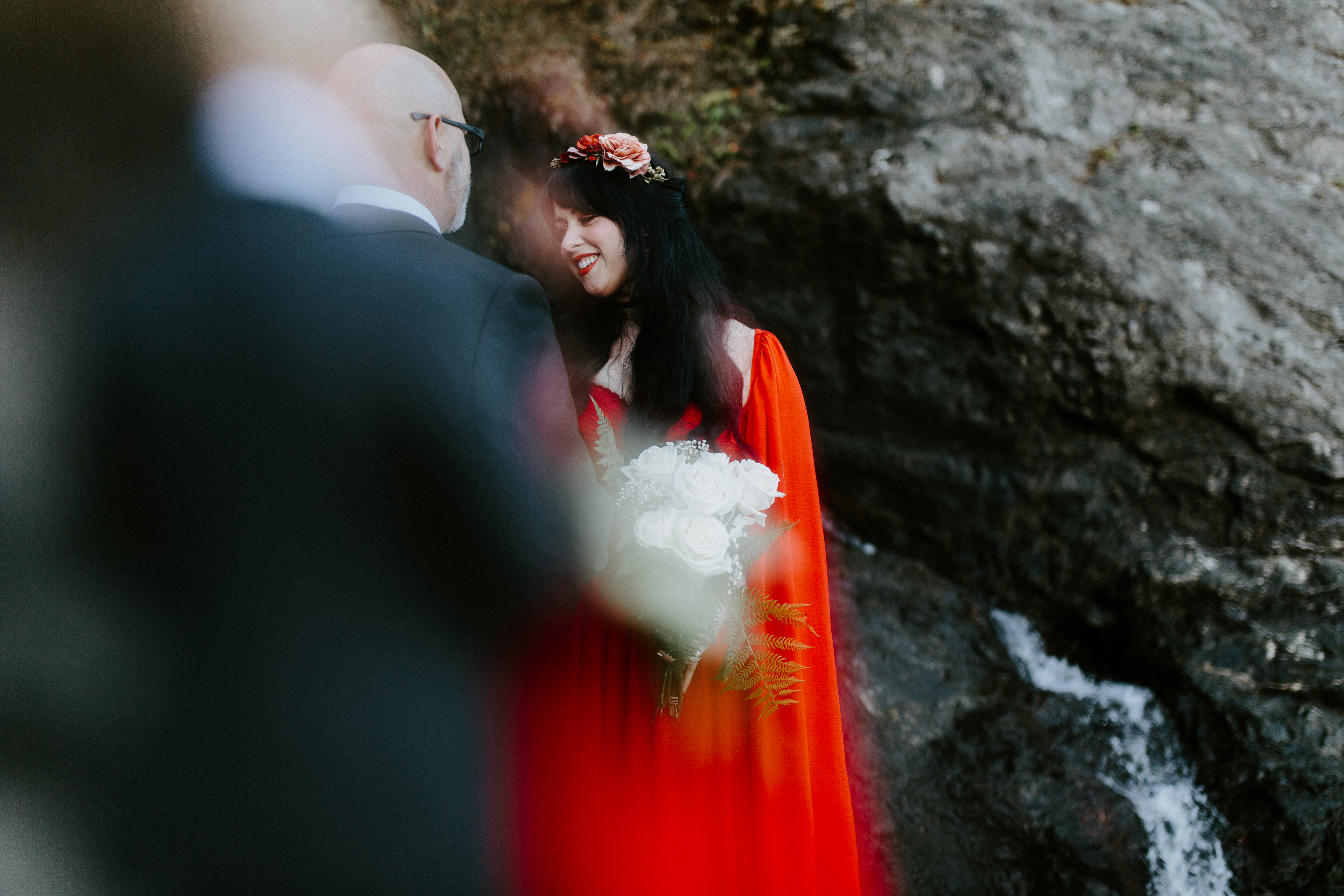 Rachael smiles at Boyd as they stand on the beach at Samuel H. Boardman, Oregon.