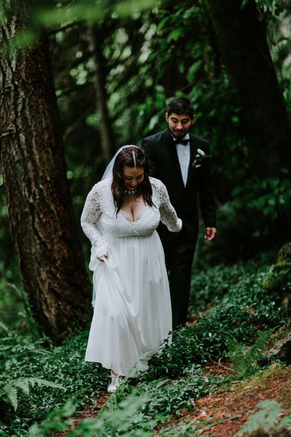 Sarah leads Sam through the woods at Skamania House, Washington. Elopement photography in Portland Oregon by Sienna Plus Josh.