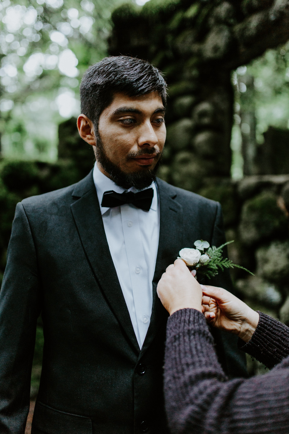 Sam gets ready at Skamania House, Washington during their Oregon Adventure. Elopement photography in Portland Oregon by Sienna Plus Josh.