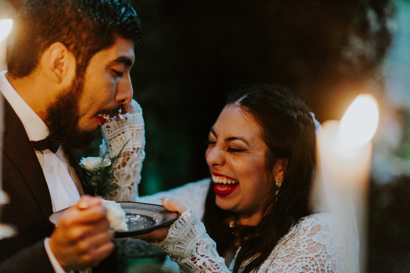 Sam and Sarah feed each other cake at Skamania House, Washington. Elopement photography in Portland Oregon by Sienna Plus Josh.