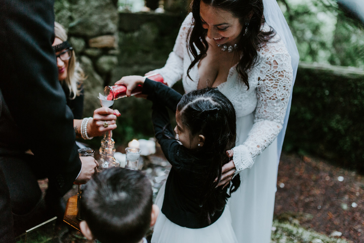 Sarah helps her daughter pour sand at Skamania House, Washington. Elopement photography in Portland Oregon by Sienna Plus Josh.