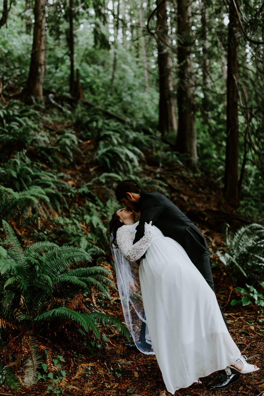 Sam dips Sarah at Skamania House, Washington. Elopement photography in Portland Oregon by Sienna Plus Josh.