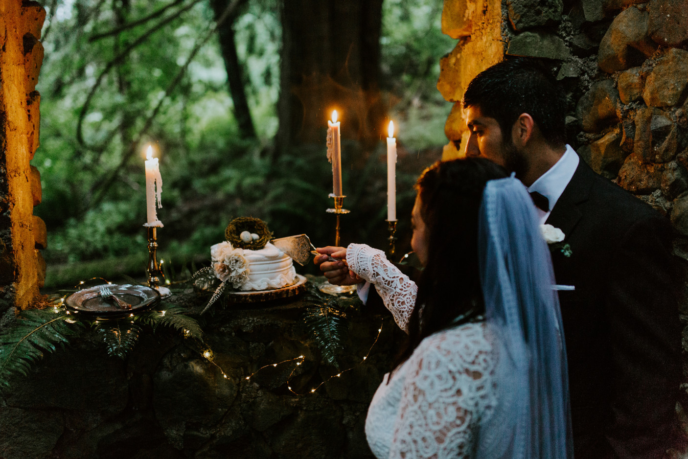 Sarah and Sam cut the wedding cake at Skamania House, Washington. Elopement photography in Portland Oregon by Sienna Plus Josh.