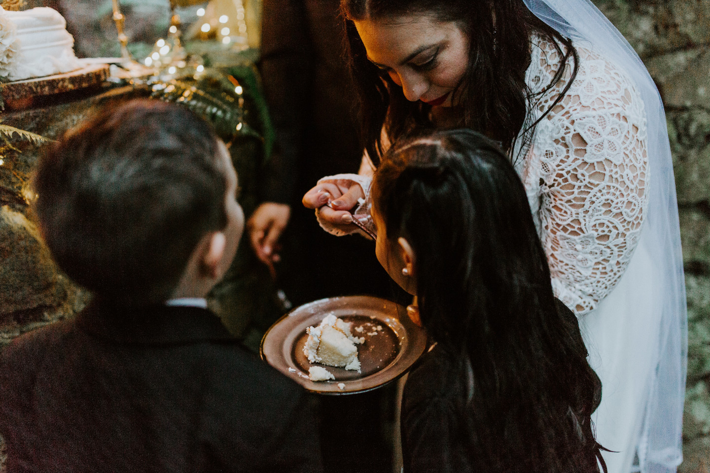 Sarah feeds her children cake at Skamania House, Washington. Elopement photography in Portland Oregon by Sienna Plus Josh.