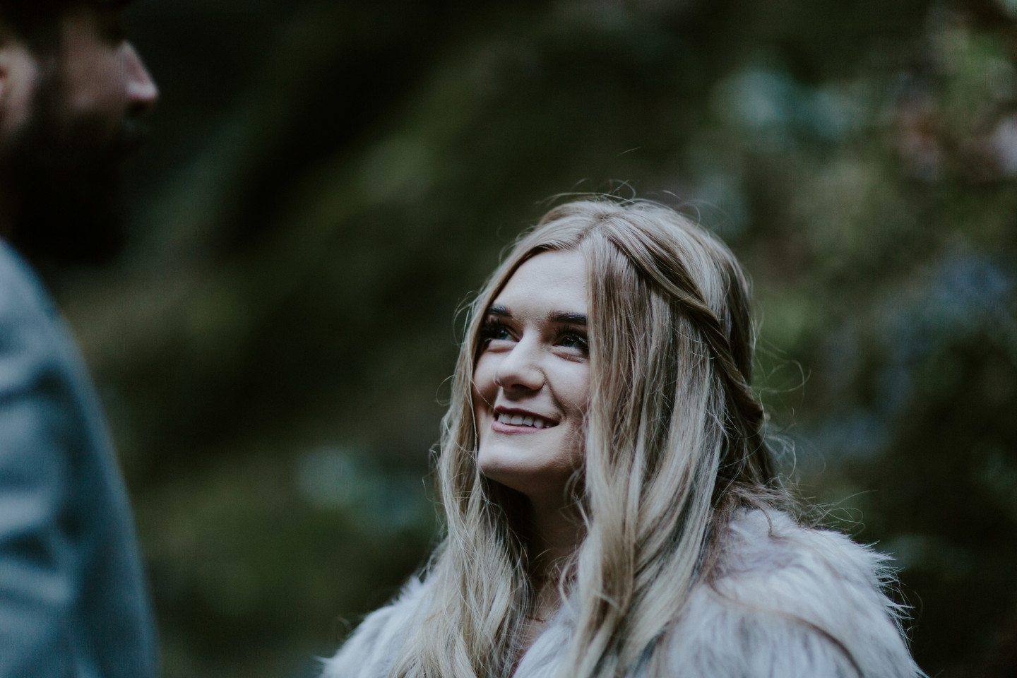 Tyanna looking up at Boris. Adventure elopement in the Columbia River Gorge by Sienna Plus Josh.