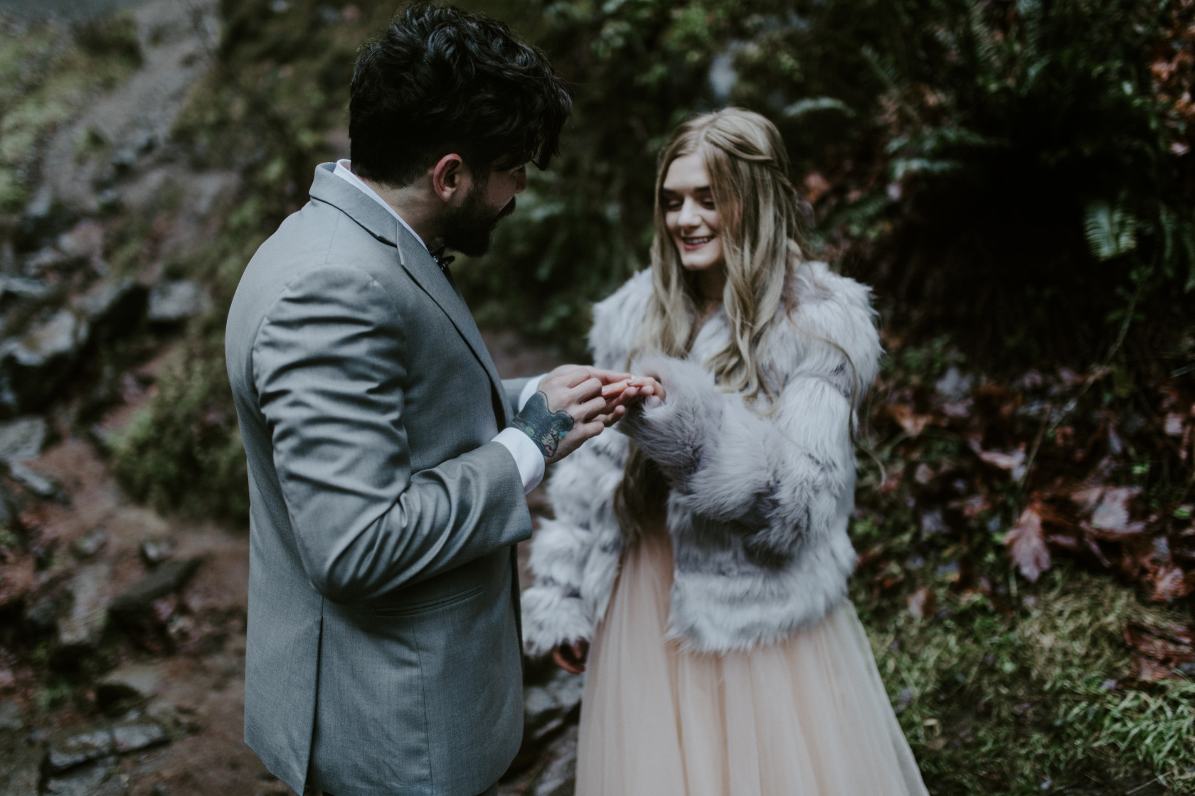 Boris puts a ring on Tyanna at Latourell Falls, OR. Adventure elopement in the Columbia River Gorge by Sienna Plus Josh.