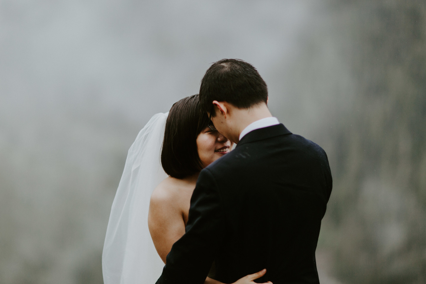 Alex holds Valerie. Elopement wedding photography at Mount Hood by Sienna Plus Josh.