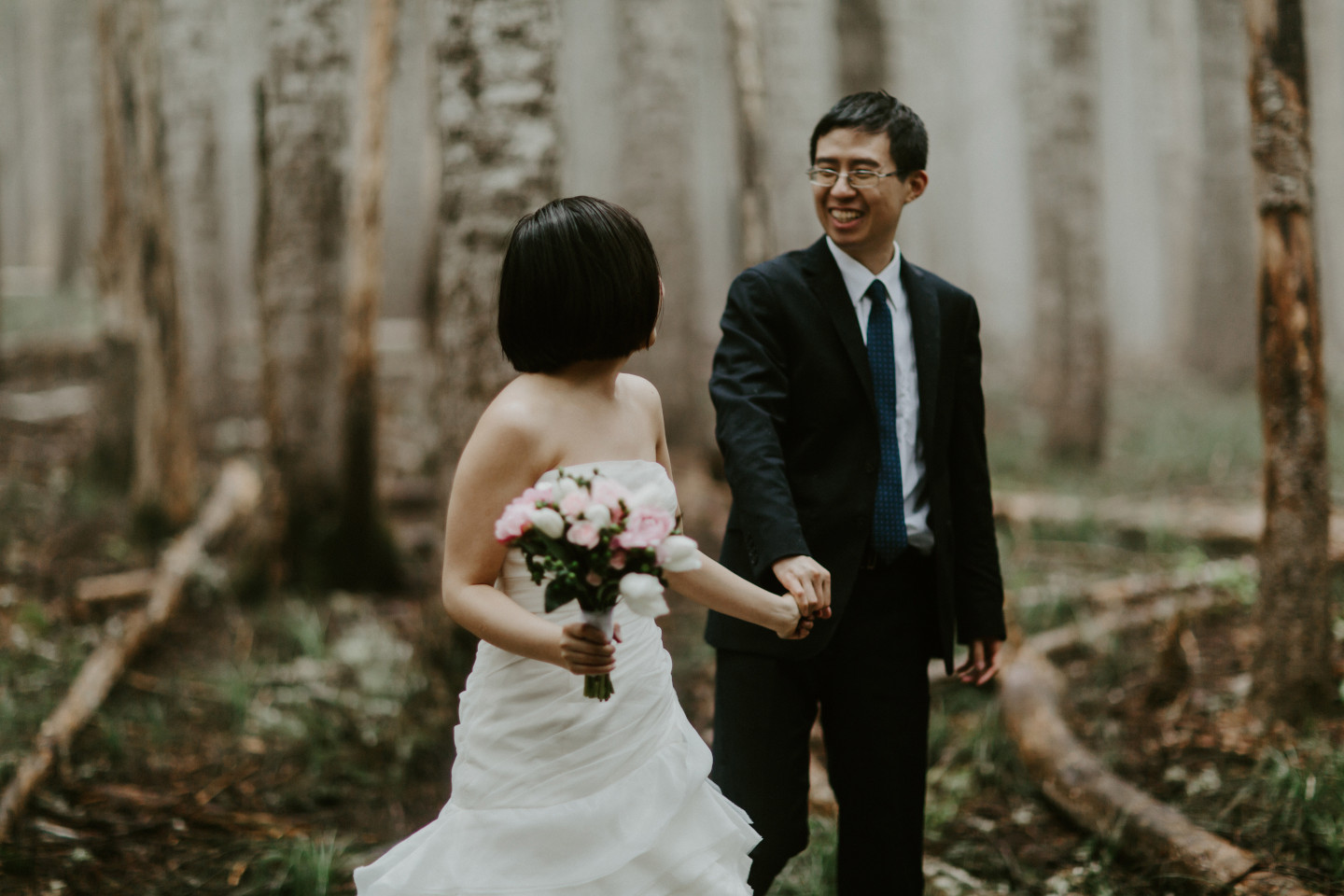 Alex and Valerie look at each other as they walk. Elopement wedding photography at Mount Hood by Sienna Plus Josh.