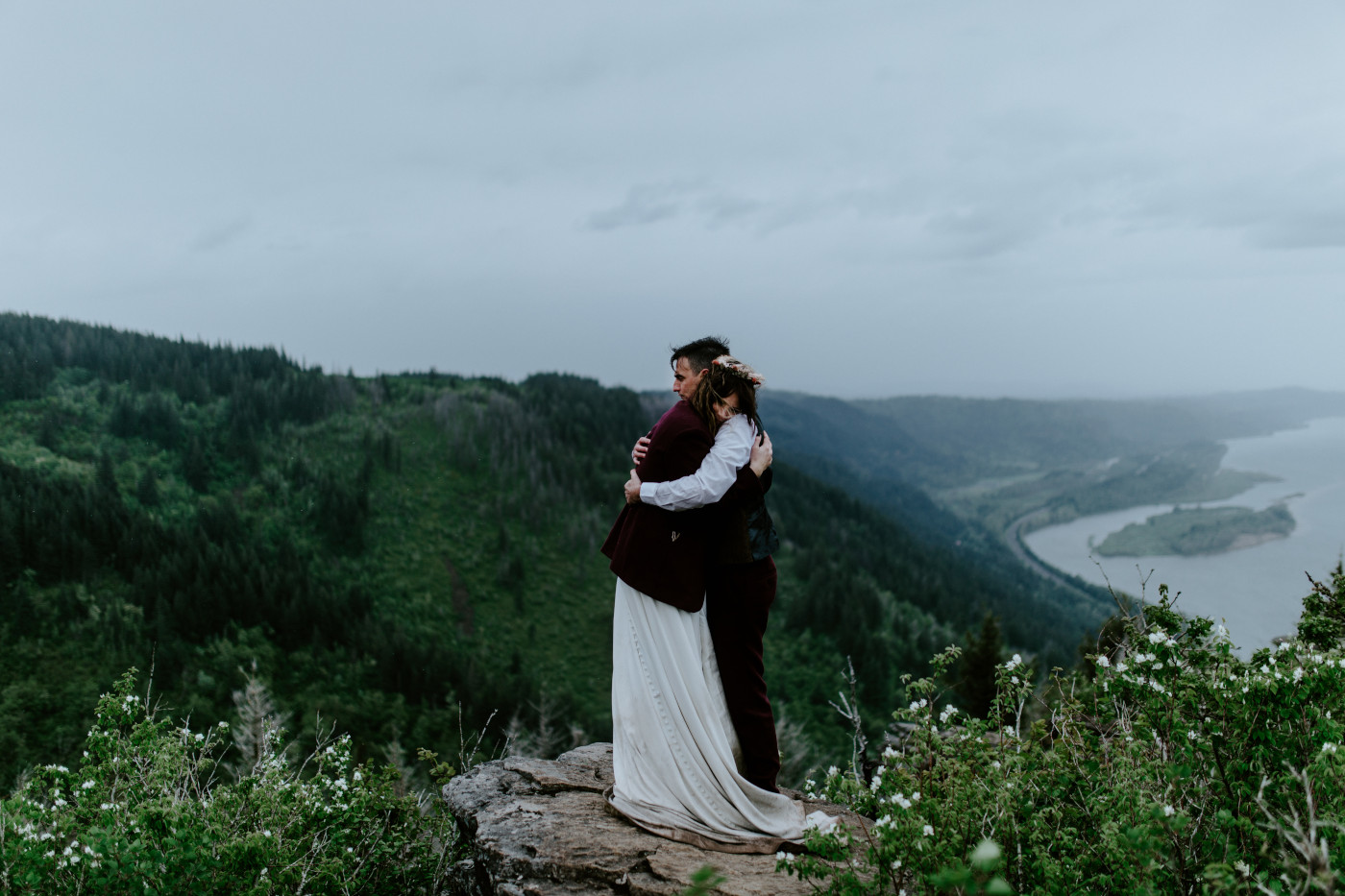 Adrew and Jordan hug on top of Angels Rest.