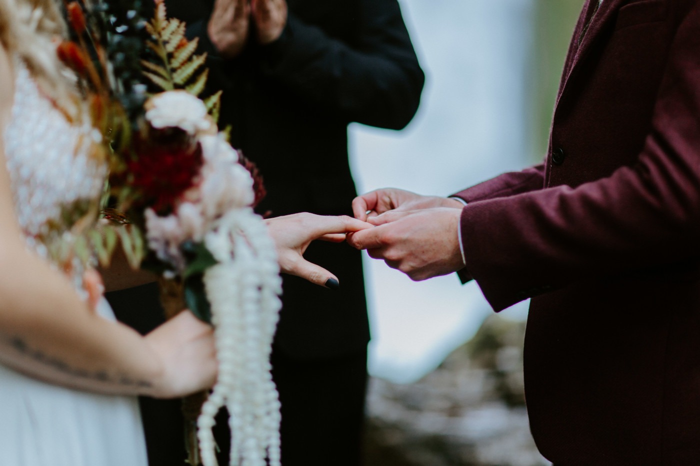 Andrew places a ring on Jordan's finger at Wahcella Falls.